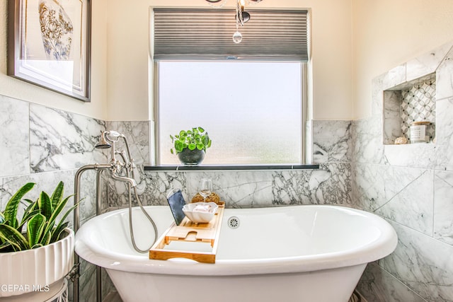 5705 Valley Lilac Ln, El Paso, TX 79932 - bathroom featuring tile walls and a soaking tub