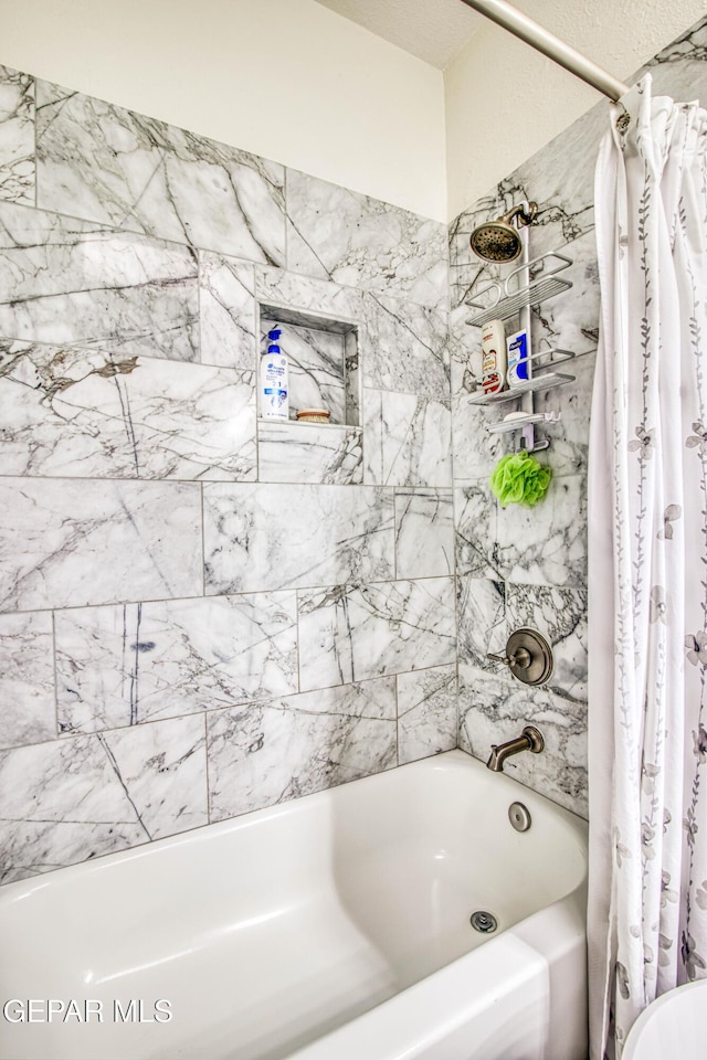 5705 Valley Lilac Ln, El Paso, TX 79932 - full bath featuring shower / bath combo with shower curtain