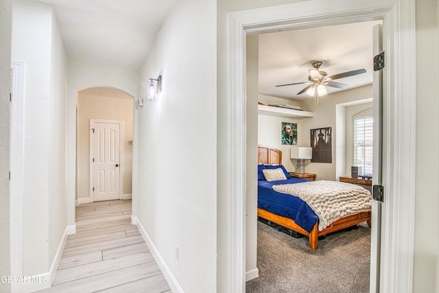 5705 Valley Lilac Ln, El Paso, TX 79932 - hall featuring arched walkways and light wood-style flooring