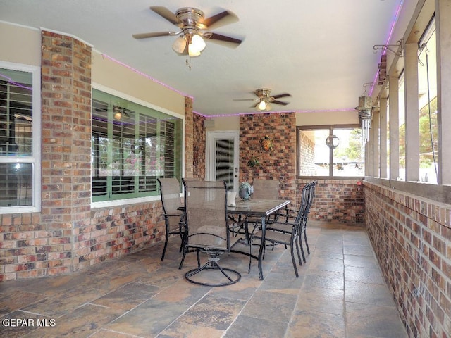 10945 Gary Player Dr, El Paso, TX 79935 - sunroom / solarium featuring a ceiling fan and outdoor dining area