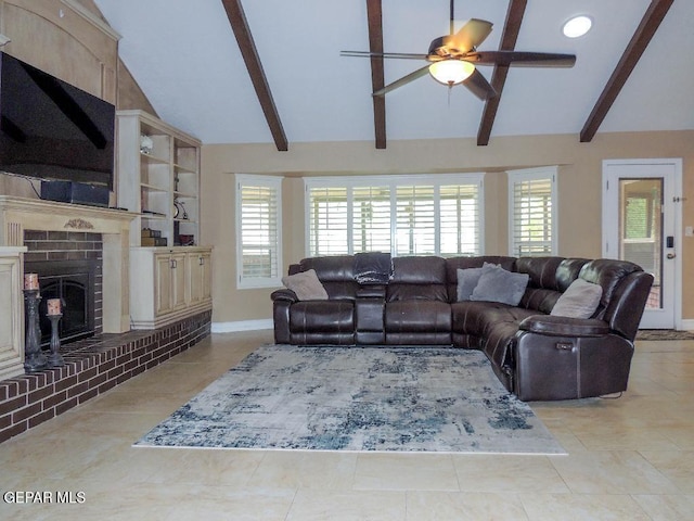 10945 Gary Player Dr, El Paso, TX 79935 - tiled living area with ceiling fan and a fireplace