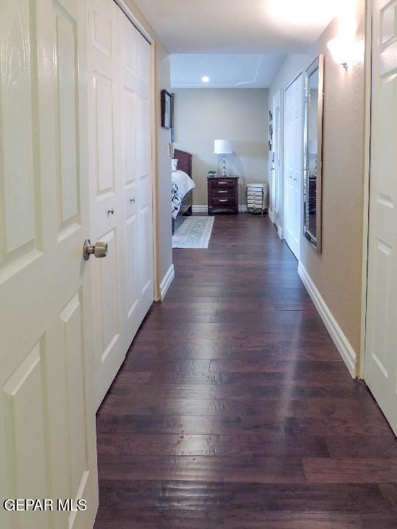 10945 Gary Player Dr, El Paso, TX 79935 - hall with wood finished floors and recessed lighting