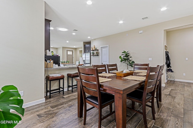 14753 Charles Foster Ave, El Paso, TX 79938 - dining area with wood finished floors and recessed lighting