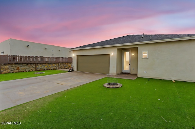 14753 Charles Foster Ave, El Paso, TX 79938 - view of front facade with stucco siding, driveway, an attached garage, and a shingled roof