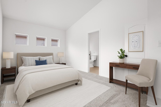 257 Farnborough St, El Paso, TX 79928 - bedroom featuring light carpet, lofted ceiling, and connected bathroom