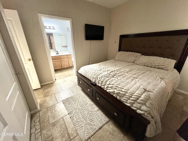632 Manzanilla Pl, El Paso, TX 79928 - bedroom with a sink and ensuite bathroom