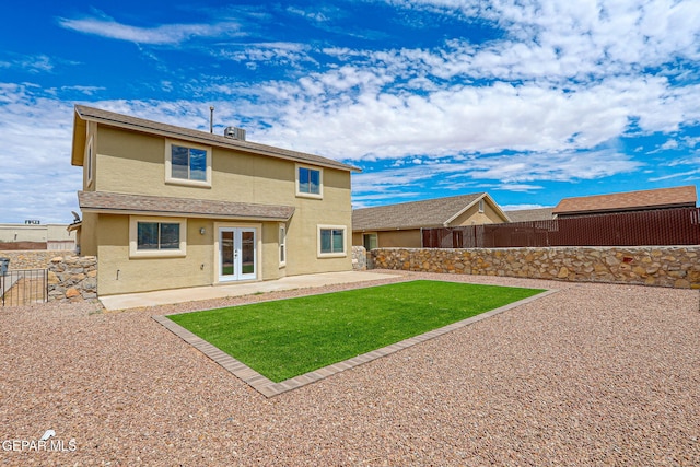 2629 Snowy Rock Pl, El Paso, TX 79938 - back of house with french doors, stucco siding, a fenced backyard, and a patio