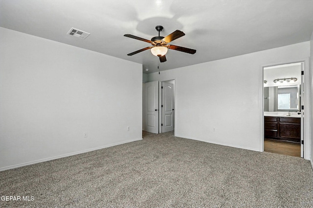 2629 Snowy Rock Pl, El Paso, TX 79938 - unfurnished bedroom featuring light colored carpet, connected bathroom, and ceiling fan