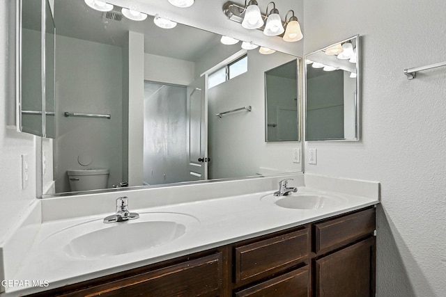 2629 Snowy Rock Pl, El Paso, TX 79938 - full bath with double vanity and toilet