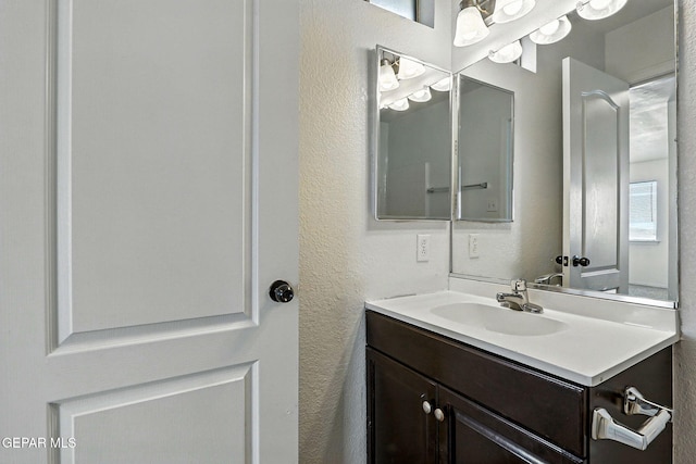 2629 Snowy Rock Pl, El Paso, TX 79938 - bathroom with vanity and a textured wall