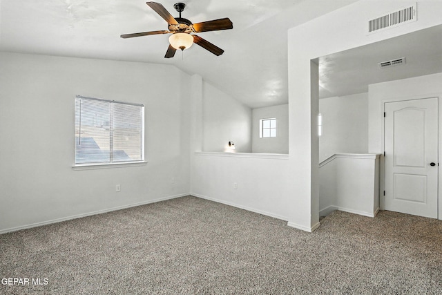 2629 Snowy Rock Pl, El Paso, TX 79938 - empty room featuring carpet floors, a ceiling fan, and vaulted ceiling