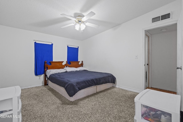10106 Mercedes St, El Paso, TX 79924 - bedroom featuring a textured ceiling, carpet flooring, and ceiling fan