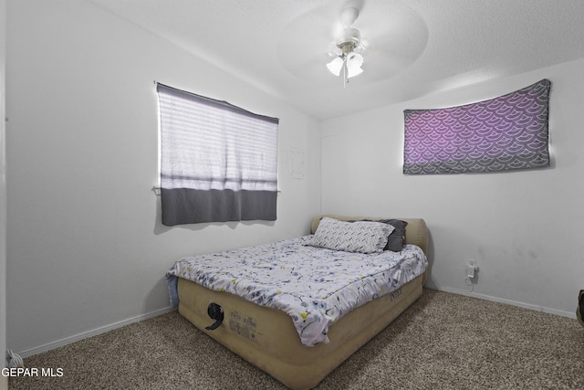10106 Mercedes St, El Paso, TX 79924 - carpeted bedroom with ceiling fan and baseboards