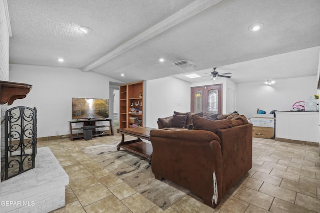 10106 Mercedes St, El Paso, TX 79924 - living room featuring a ceiling fan, a textured ceiling, and recessed lighting