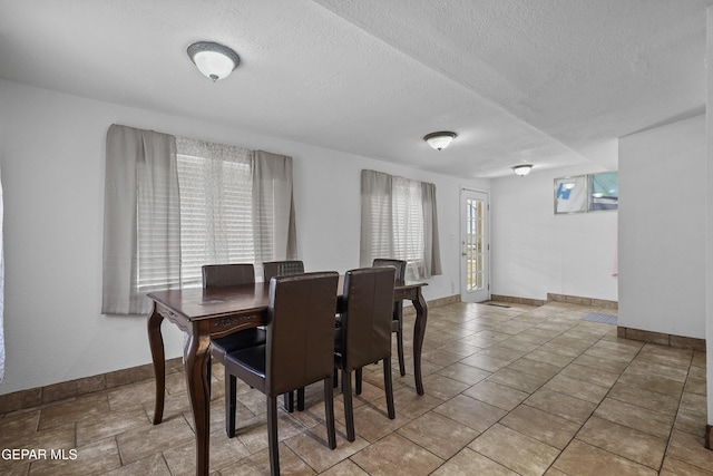 10106 Mercedes St, El Paso, TX 79924 - dining space with a textured ceiling