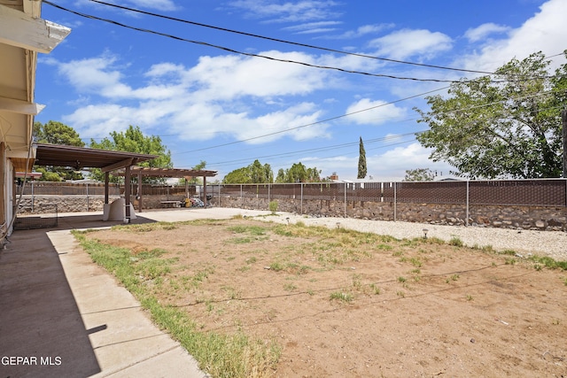 10106 Mercedes St, El Paso, TX 79924 - fenced backyard with a patio and a pergola