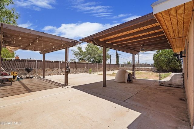 10106 Mercedes St, El Paso, TX 79924 - fenced backyard featuring a patio, a pergola, and a ceiling fan