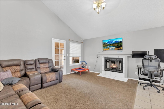 11651 Great Spirit Cir, El Paso, TX 79936 - living area featuring a fireplace, high vaulted ceiling, a desk, light colored carpet, and light tile patterned floors