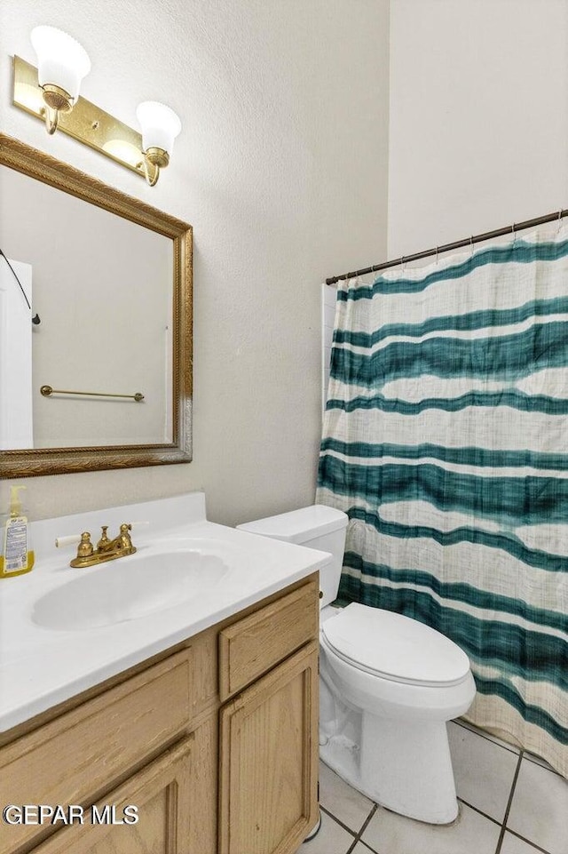 11651 Great Spirit Cir, El Paso, TX 79936 - bathroom featuring vanity and tile patterned flooring