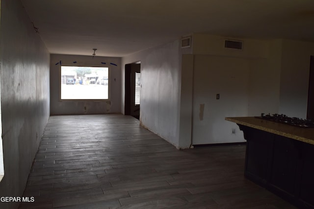 7556 N Loop Dr, El Paso, TX 79915 - hall featuring wood finished floors
