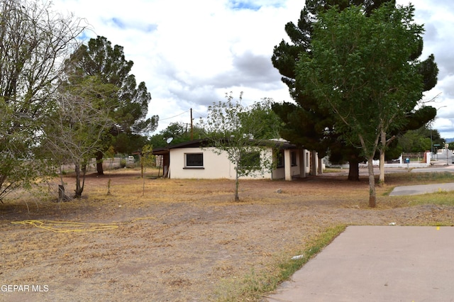 7556 N Loop Dr, El Paso, TX 79915 - view of front of property with stucco siding