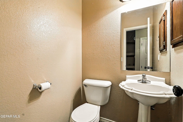 12308 Sombra Grande Dr, El Paso, TX 79938 - bathroom with toilet and a textured wall