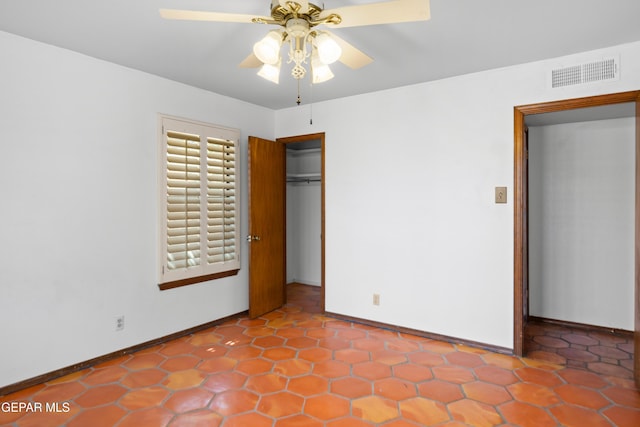 11204 Bob Mitchell Dr, El Paso, TX 79936 - unfurnished bedroom with baseboards and ceiling fan