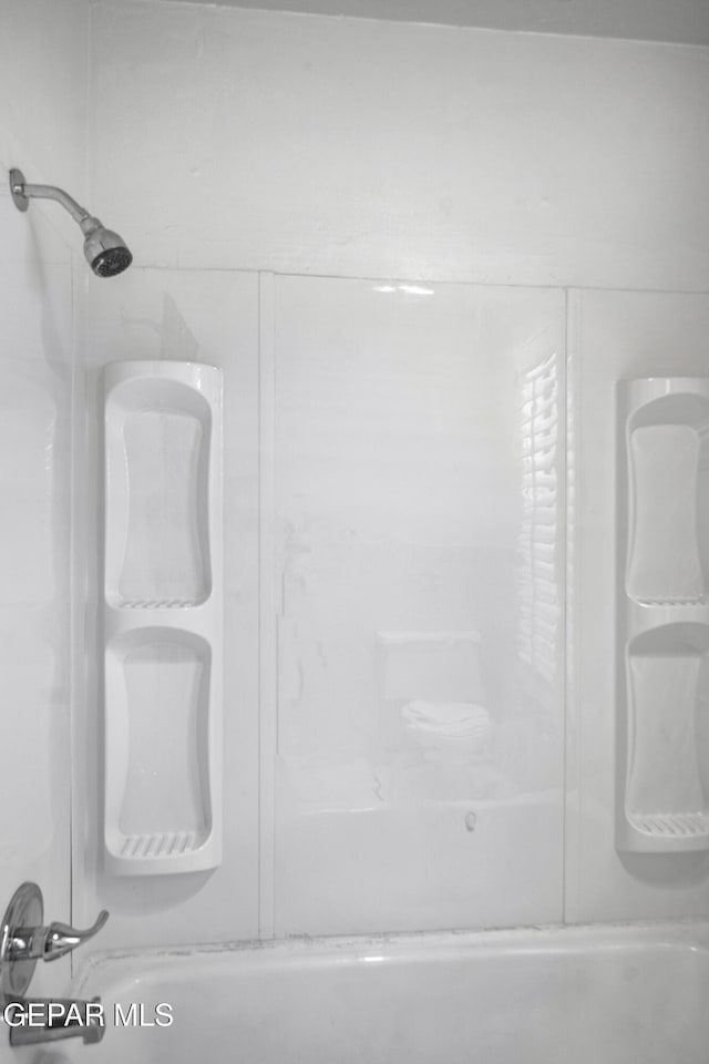 11204 Bob Mitchell Dr, El Paso, TX 79936 - full bathroom featuring bathing tub / shower combination