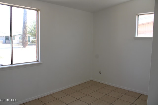 5124 Edmonton Ave, El Paso, TX 79924 - spare room with baseboards and light tile patterned floors
