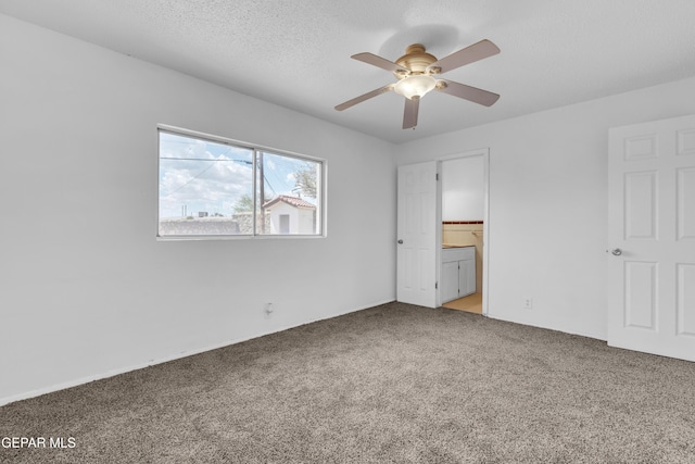 6033 Isabella Dr, El Paso, TX 79912 - unfurnished bedroom with carpet, connected bathroom, and ceiling fan