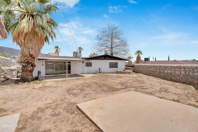6033 Isabella Dr, El Paso, TX 79912 - rear view of property featuring a patio area and stucco siding