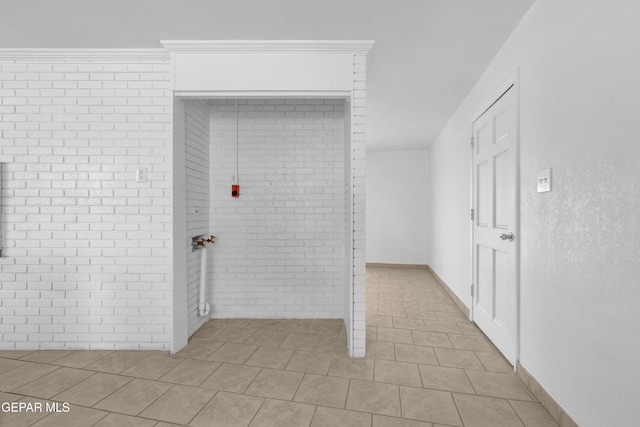6033 Isabella Dr, El Paso, TX 79912 - corridor featuring light tile patterned flooring