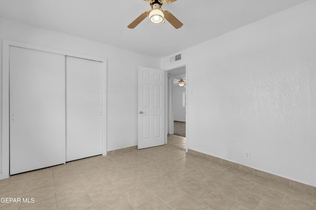 6033 Isabella Dr, El Paso, TX 79912 - unfurnished bedroom with a closet and ceiling fan