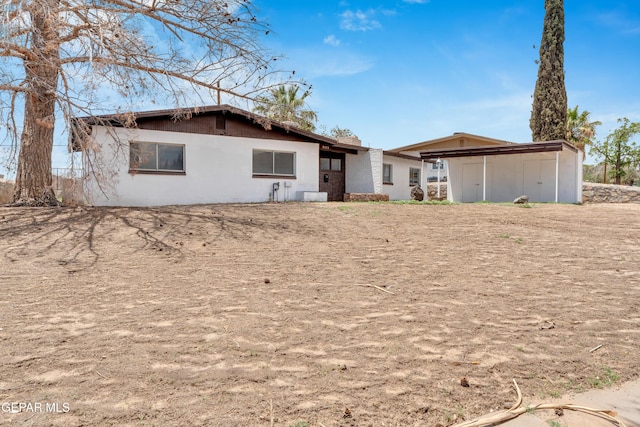 6033 Isabella Dr, El Paso, TX 79912 - back of property with stucco siding