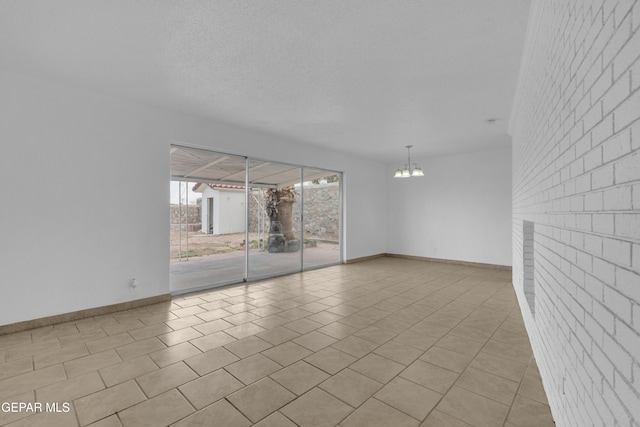 6033 Isabella Dr, El Paso, TX 79912 - empty room with a chandelier and tile patterned floors