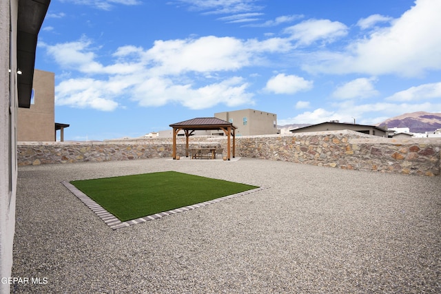 2308 Enchanted Quail, El Paso, TX 79911 - fenced backyard featuring a gazebo and a patio