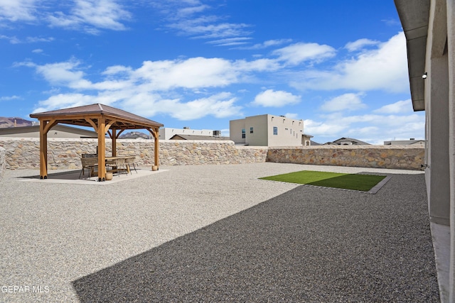 2308 Enchanted Quail, El Paso, TX 79911 - fenced backyard with a gazebo and a patio
