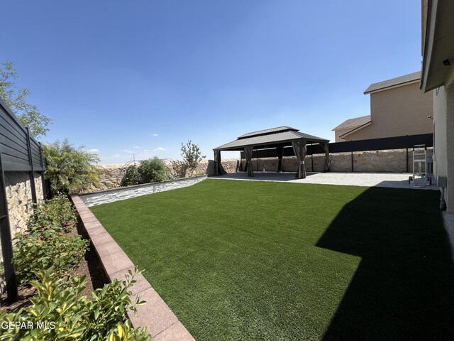 1160 Cielo Mar Dr, Socorro, TX 79927 - fenced backyard featuring a gazebo and a patio area