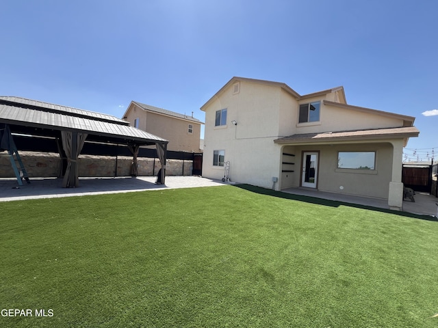 1160 Cielo Mar Dr, Socorro, TX 79927 - back of property with a gazebo, a patio, and stucco siding
