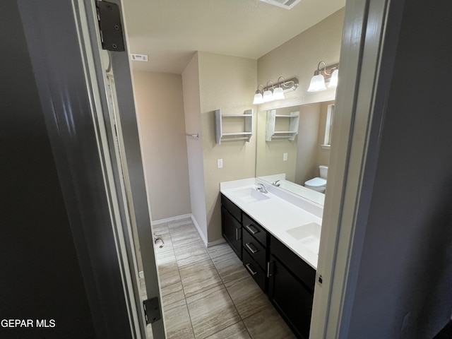 1160 Cielo Mar Dr, Socorro, TX 79927 - bathroom with double vanity and tile patterned floors