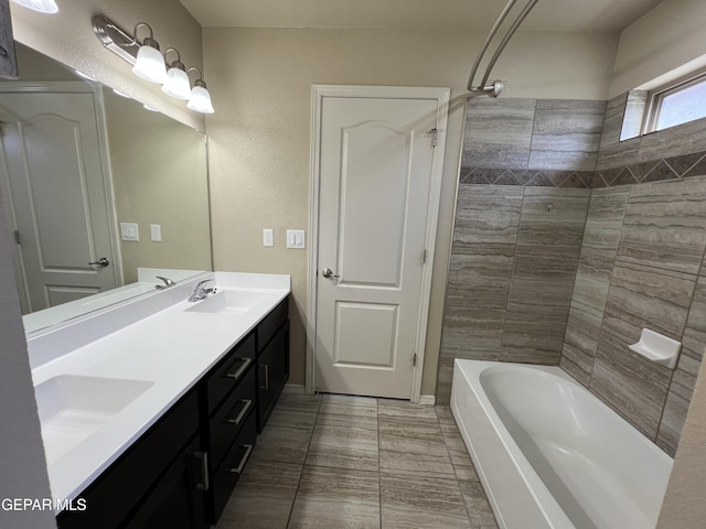 1160 Cielo Mar Dr, Socorro, TX 79927 - full bathroom featuring double vanity and tub / shower combination
