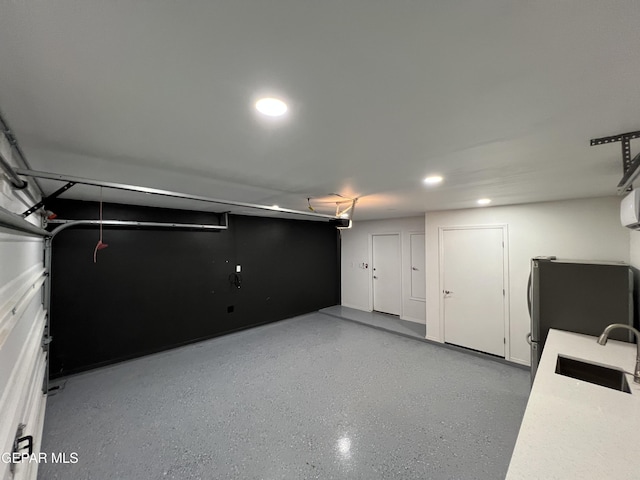 1160 Cielo Mar Dr, Socorro, TX 79927 - garage with freestanding refrigerator and recessed lighting