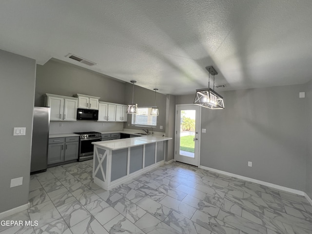 1160 Cielo Mar Dr, Socorro, TX 79927 - kitchen with appliances with stainless steel finishes, light marble finish floors, a peninsula, light countertops, and white cabinetry