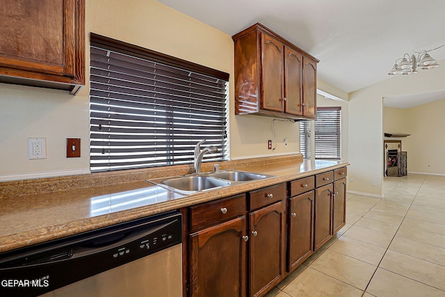 2912 Chaswood St, El Paso, TX 79935 - kitchen with stainless steel dishwasher and light tile patterned floors