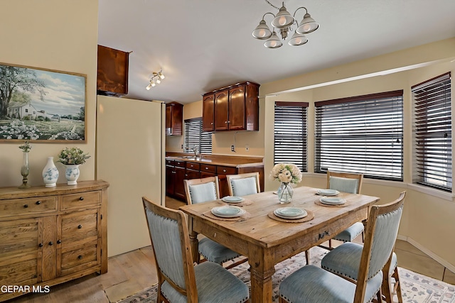 2912 Chaswood St, El Paso, TX 79935 - dining area with a chandelier