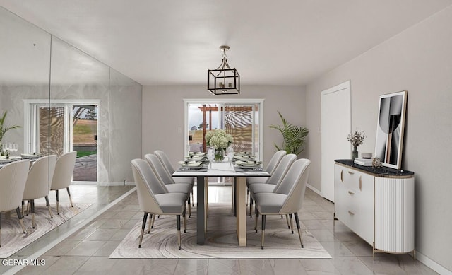 1005 Singing Hills Dr, El Paso, TX 79912 - dining room with plenty of natural light, a chandelier, and light marble finish flooring