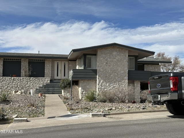 1005 Singing Hills Dr, El Paso, TX 79912 - view of front of home featuring stone siding