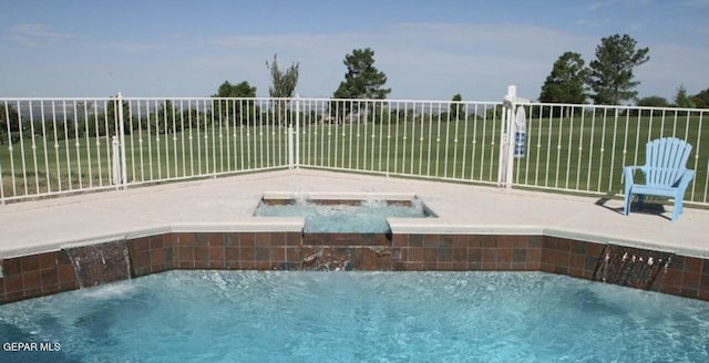1005 Singing Hills Dr, El Paso, TX 79912 - view of swimming pool with an in-ground hot tub