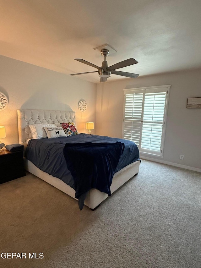 1005 Singing Hills Dr, El Paso, TX 79912 - carpeted bedroom with a ceiling fan and baseboards