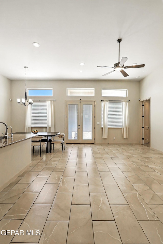 14512 Dominic Azcarate Dr, El Paso, TX 79938 - living area with french doors, a ceiling fan, recessed lighting, a chandelier, and light tile patterned floors